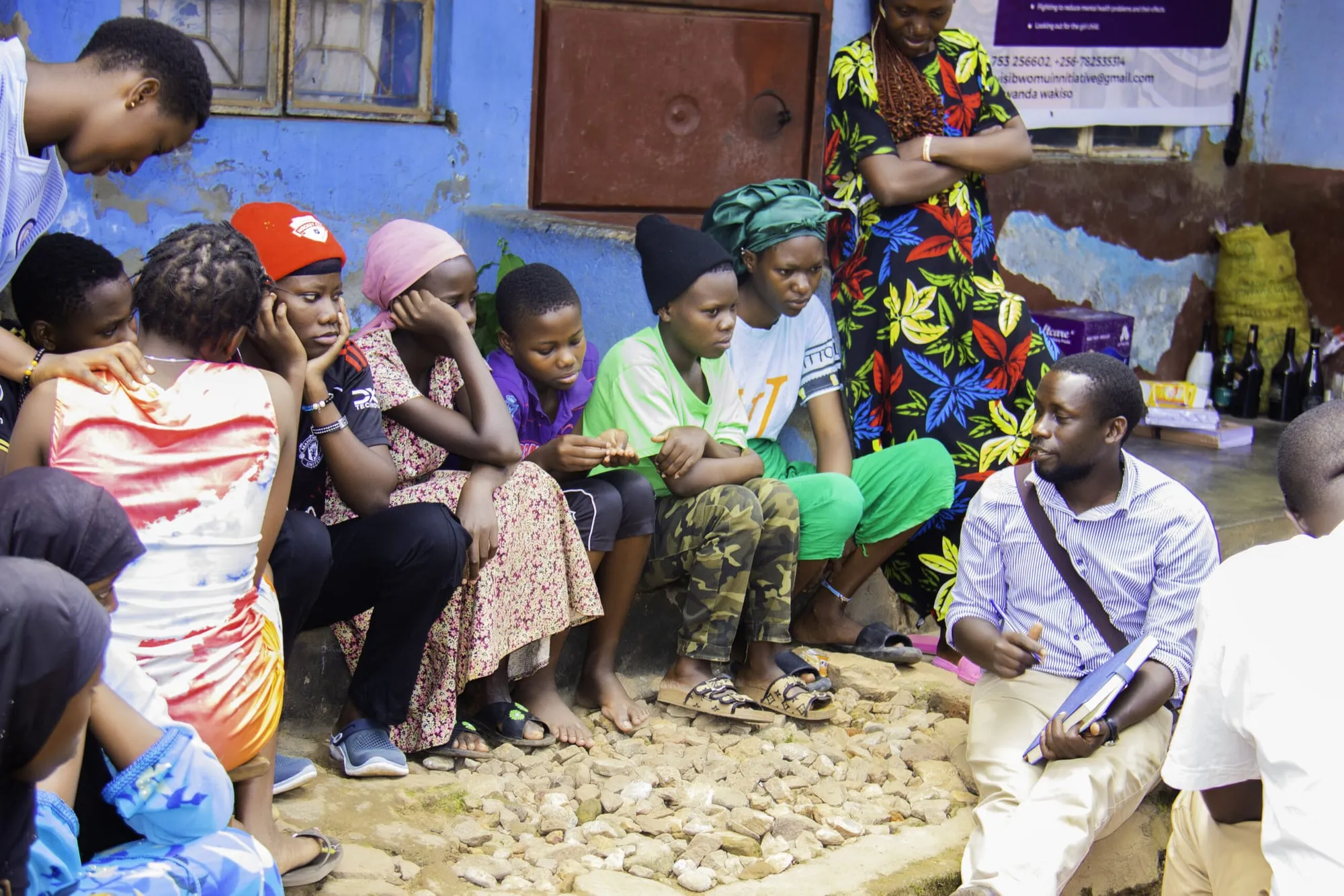 Community members in Bwaise gathered for an awareness session